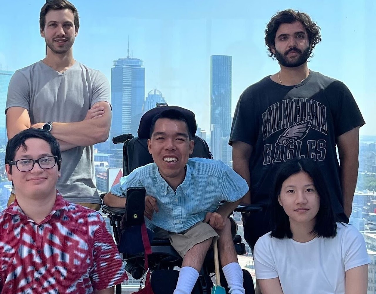 Photo of CDS Assistant Professor Pawel Przytycki and lab students