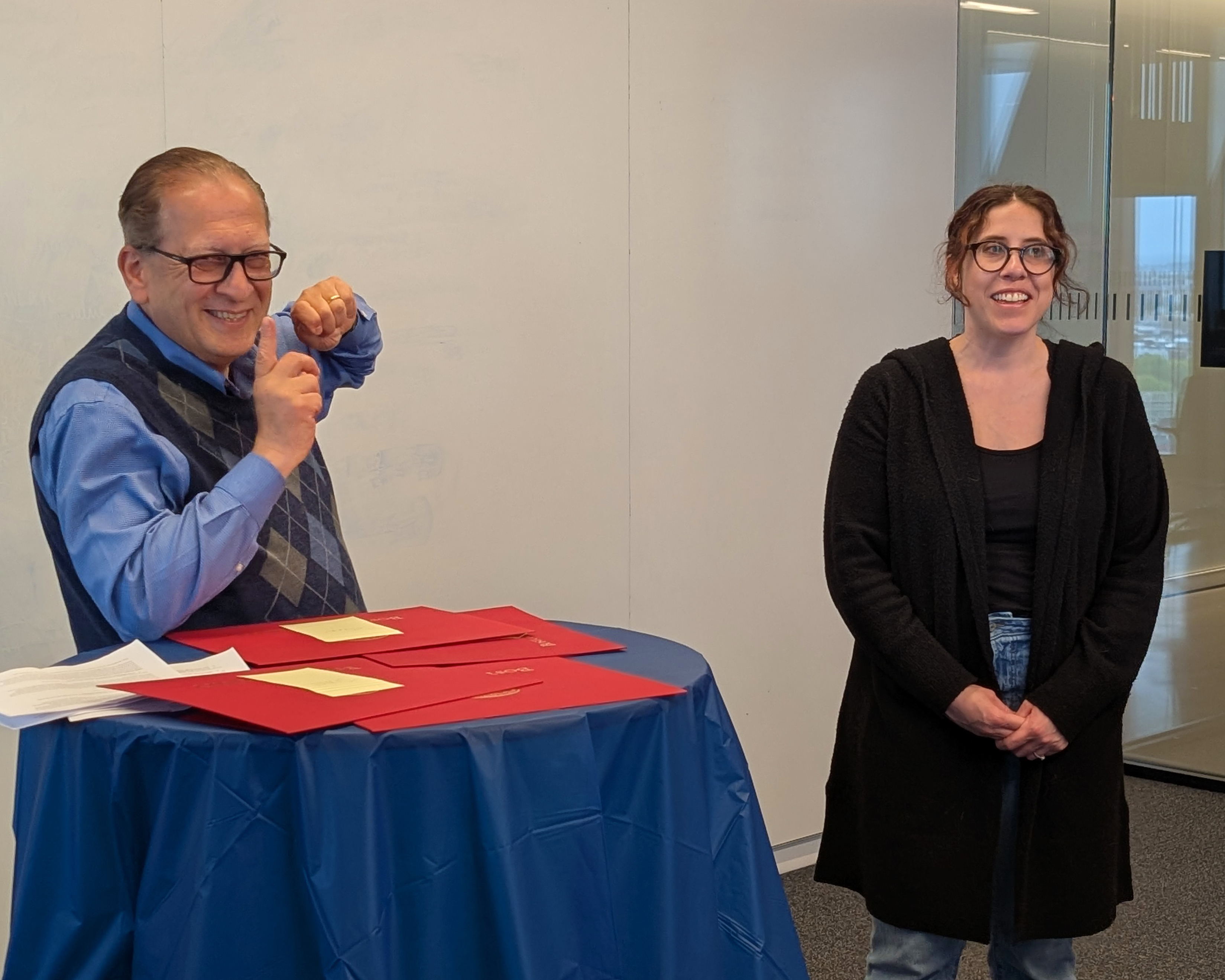 Photo of CDS 2026 Faculty, Staff, and Student awards event with Associate Provost Azer Bestavros and Colleen Gilman