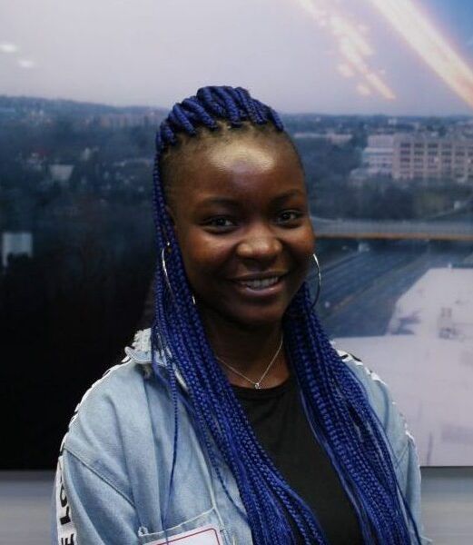 Headshot of Shola Onissema-Karimu