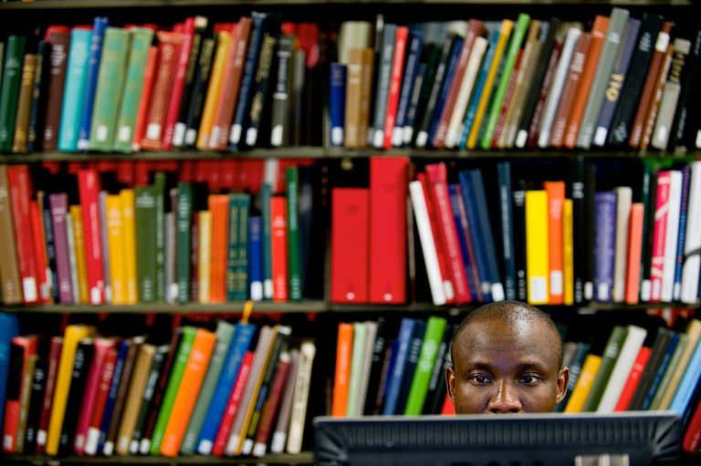 Man studying in library