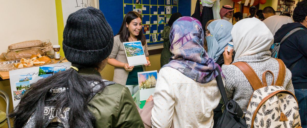 CELOP students at a cultural fair in the CELOP lobby