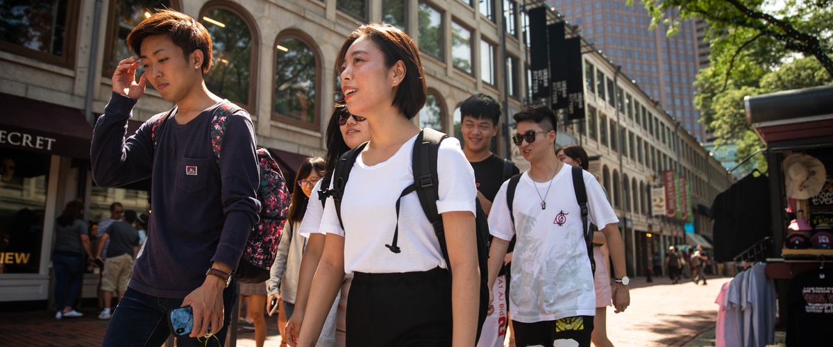 CELOP students walking around Faneuil Hall in Boston