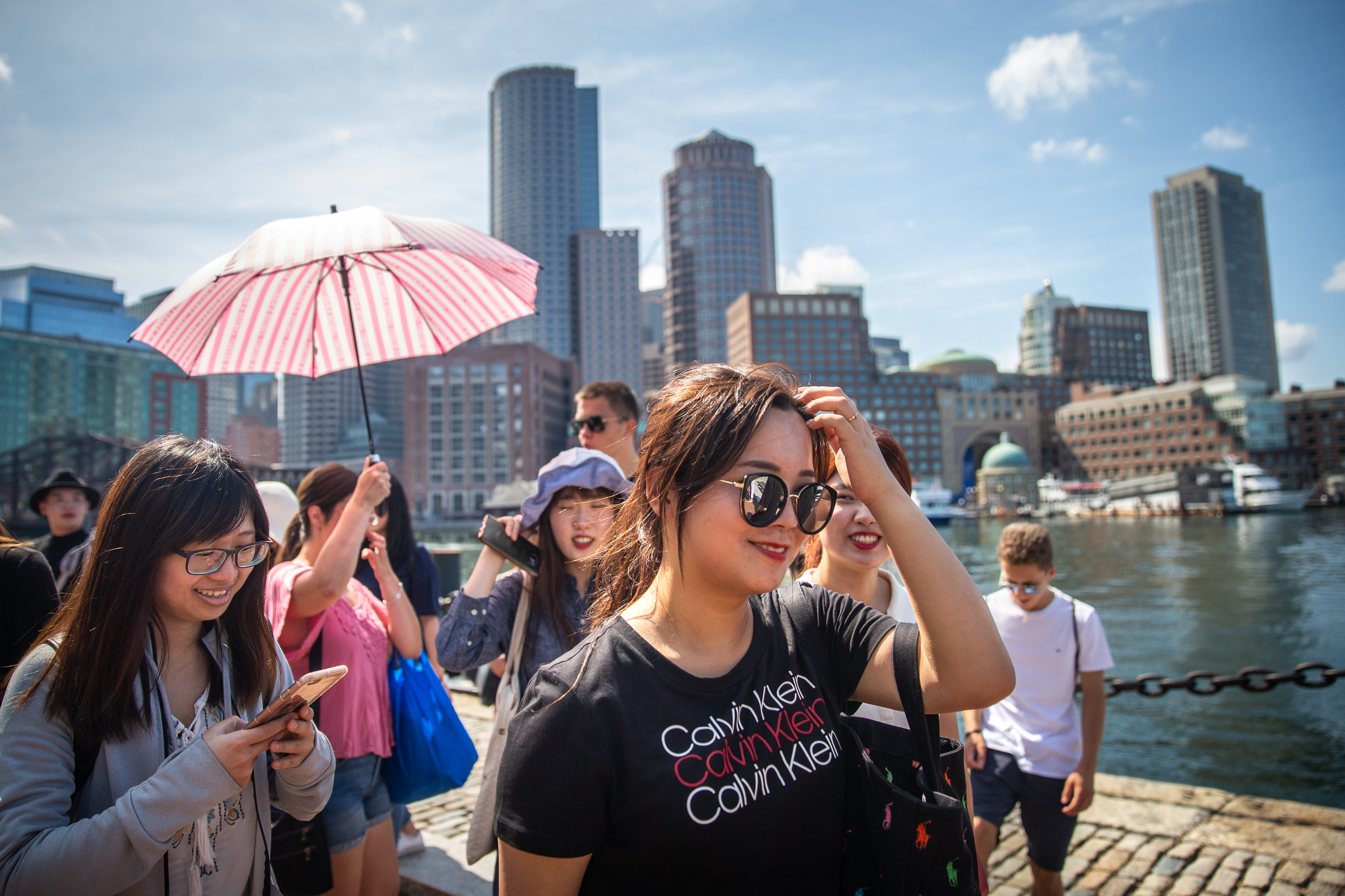 CELOP students walking along the boston harbor