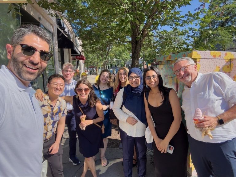 Group picture of CELOP staff outside in the sun