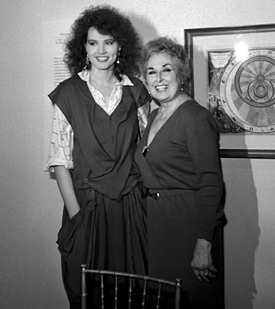 Boston University School of Theatre student Geena Davis at a Kahn Scholarship press conference and lunch, posing with Dean Phyllis Curtin.