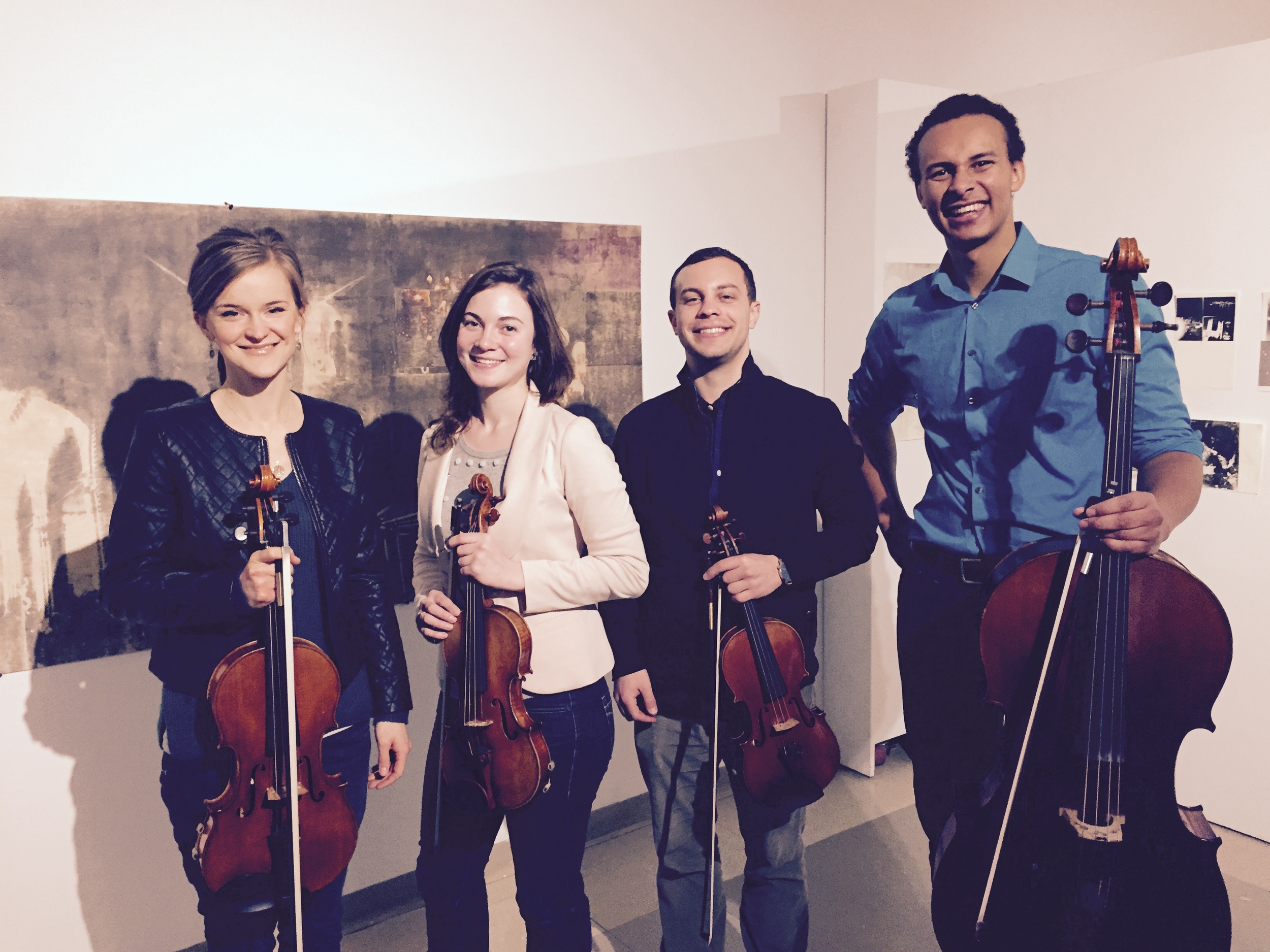 Amberley Lamphere (’15) (left), MaeLynn Arnold (BUTI’05,’06, CFA’09,’15), Michael Hustedde (BUTI’08, CFA’13,’15), and Daniel Dickson (’16,’20) are members of the Denovo Quartet, a Boston-based string quartet that debuted in 2015.