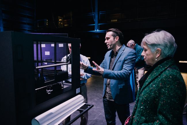 Rhinoceros director Clay Hopper describes a model of the theatre.