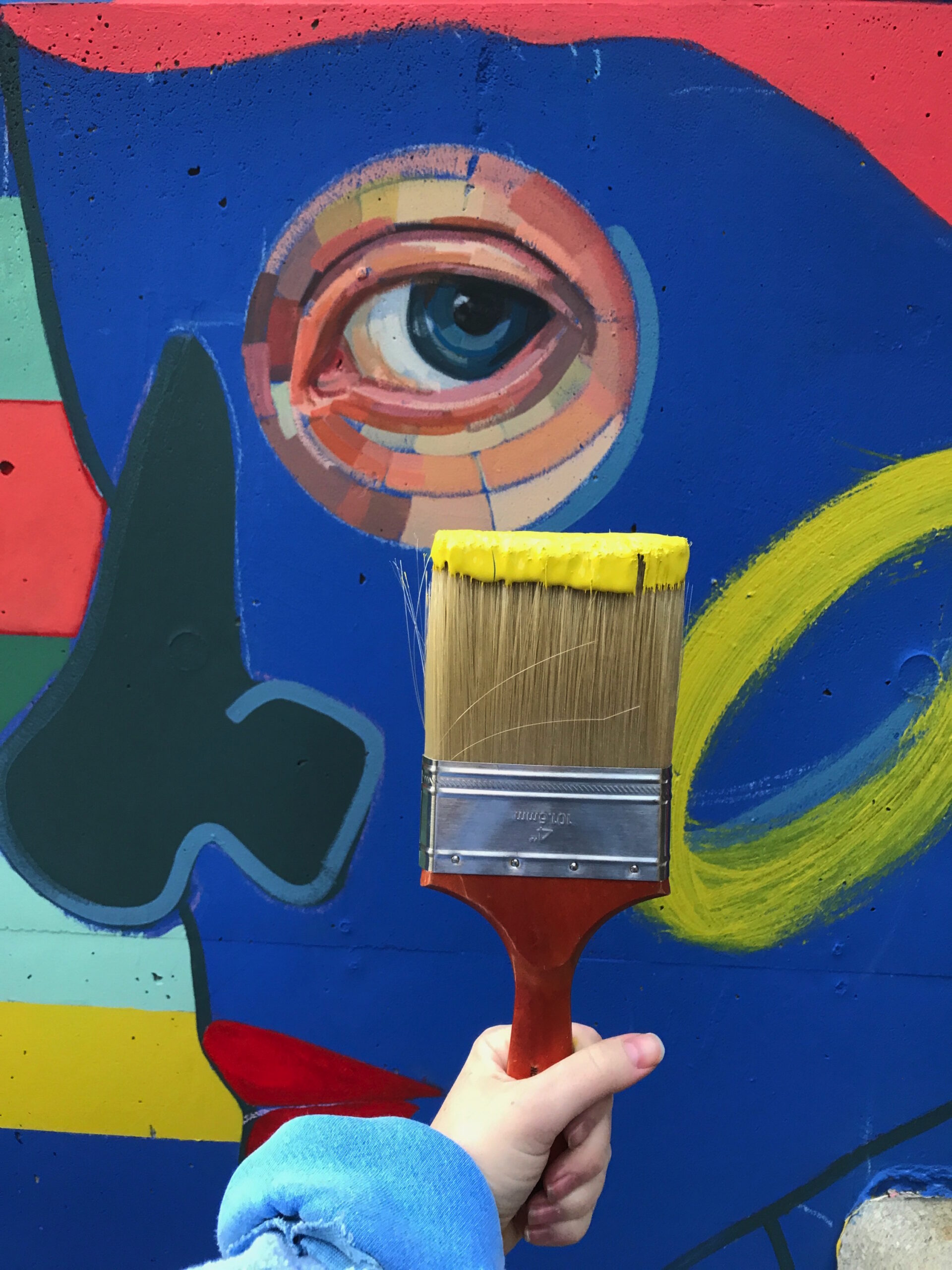 An eye on the mural.