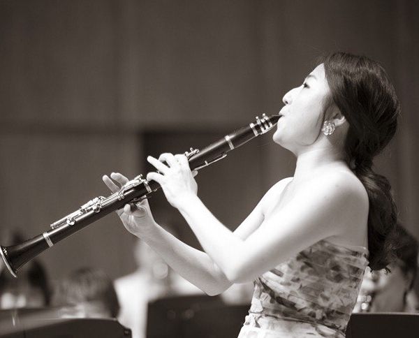 Danby Choy Headshot with Clarinet