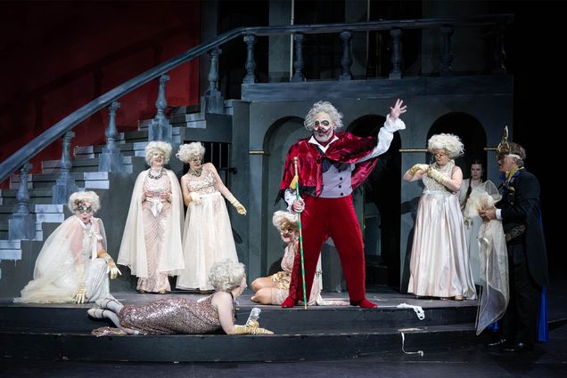 Stefano Meo as Rigoletto and members of the chorus in Opera på Skäret’s Rigoletto, wearing costumes designed by Susan Mickey, School of Theatre director.