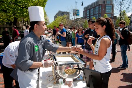 Get your green on! Sustainability@BU held an Earth Day celebration yesterday outside the George Sherman Union. The event featured a free chowderfest, as well as music, a farmers market, and giveaways. Lauren Gonzalez (CGS'13) tried the chowder, provided by BU Dining Services. Photo by Vernon Doucette