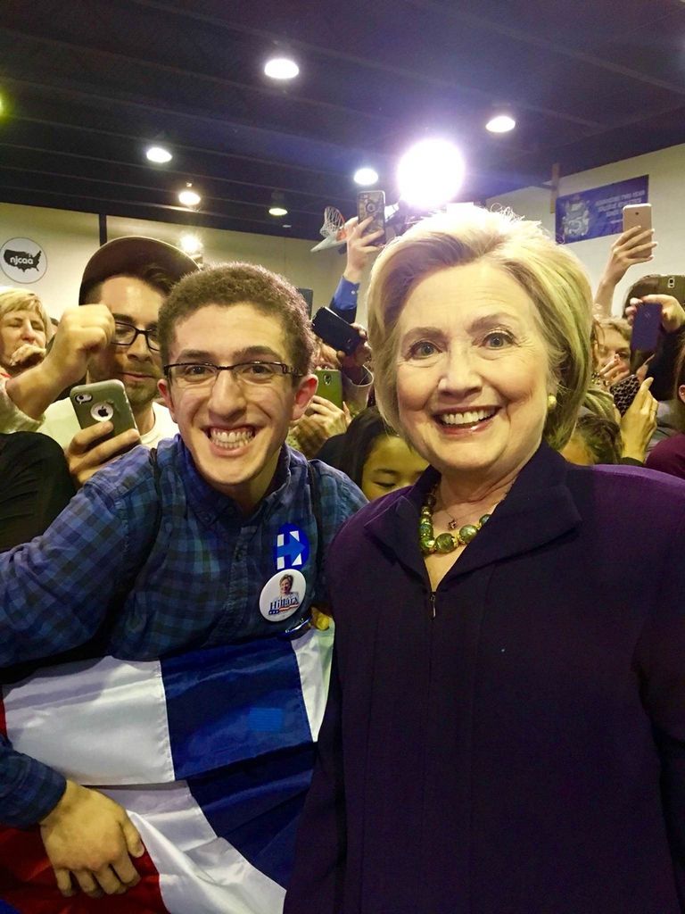 Benjamin Levy, wearing a Hillary button, next to Hillary Clinton