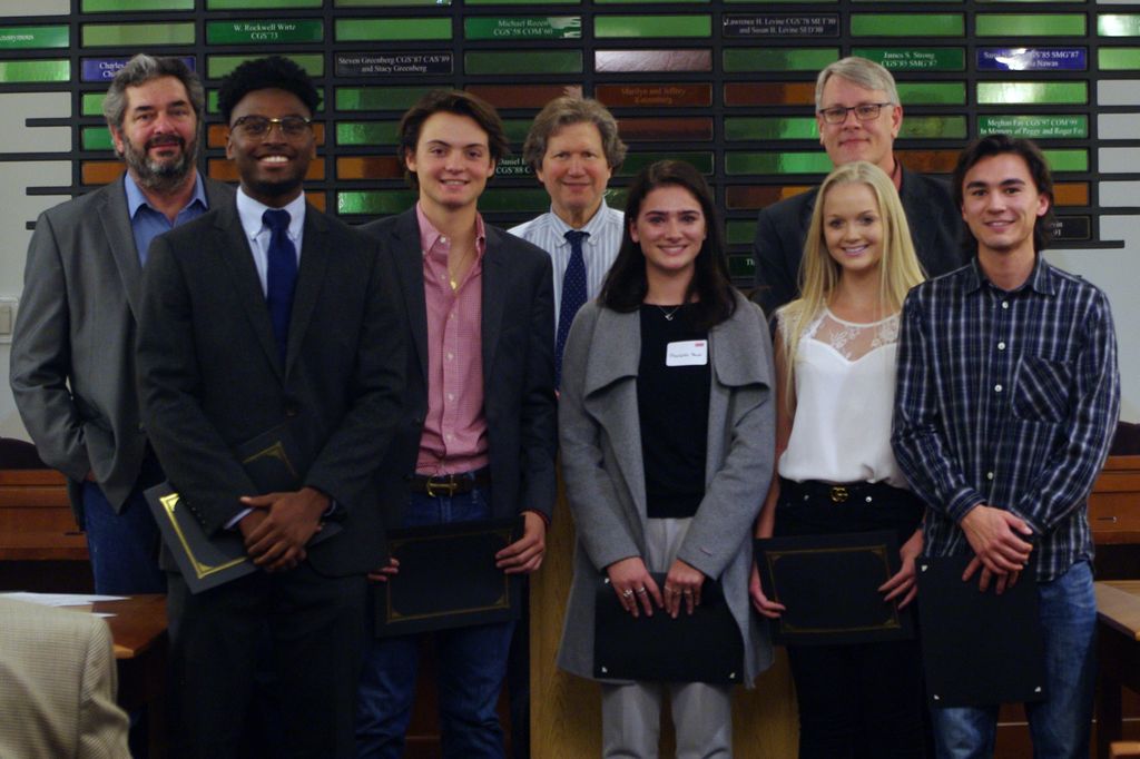 A Capstone team receiving an award