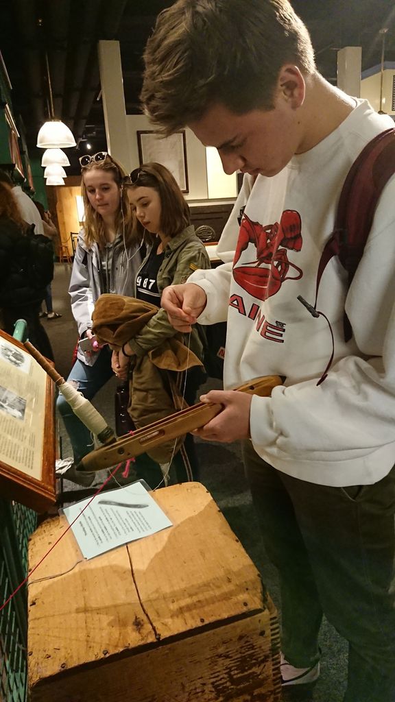 Sarah Jones (CGS'19, COM'21) (from left), Sydney Clark (CGS'19, COM'21), and Spencer Bernard (CGS'19, COM'21) explore industrial weaving at the Boott Cotton Mills in Lowell, Mass., in 2018. Class trips like these have been incorporated into past fall and spring semesters, and many will be part of the Boston-New England curriculum. Photo by Annie Lin