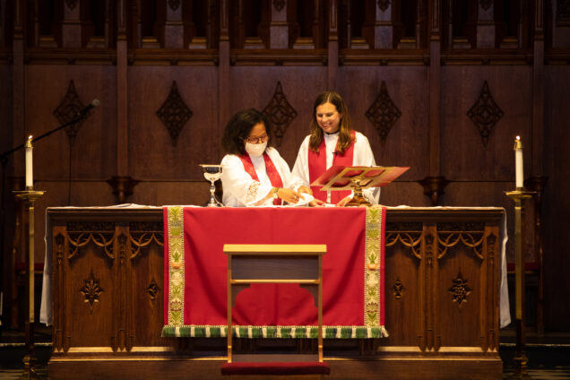 Reverends Jess and Karen preside over communion in the chapel sanctuary