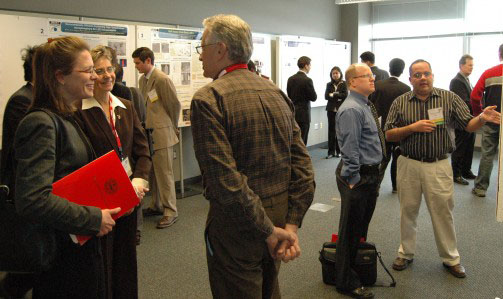 Nearly 120 participants from academia, government and industry attended “Smart Spaces: A Smart Lighting ERC Academia—Industry Day” at the Boston University Photonics Center on Feb. 8. Here, they enjoy a research poster session.