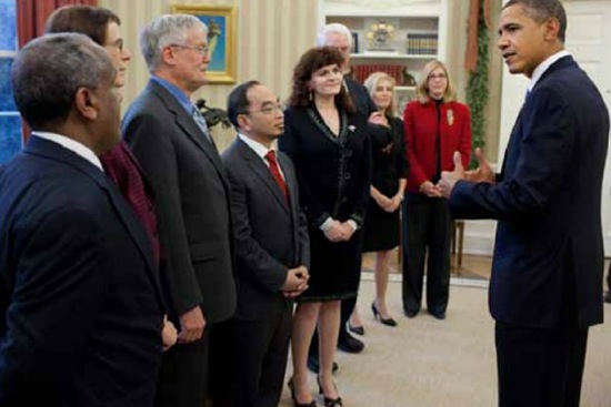 Karen Panetta (fifth from left) is among recipients of the 2010 and 2011 Presidential Award for Excellence in Science, Mathematics and Engineering Mentoring being greeted by President Barack Obama in the Oval Office on December 12, 2011. Photo courtesy of the White House/Photo by Pete Souza (COM’76)