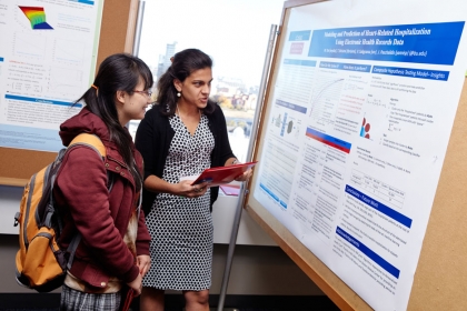 BU Systems Engineering PhD student Tingting Xu and ECE PhD student Theodora Brisimi during a poster session