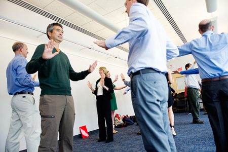 Nathan Philips, a CAS professor of earth and environment (second from left), participates in an improv exercise called “mirror,” designed to teach scientists how to interpret the needs of others. Photos by Jackie Ricciardi