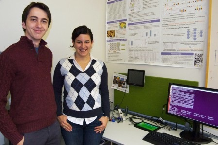 ECE PhD student Onur Sahin (left) and advisor Professor Ayse Coskun (right) stand in the Performance and Energy-Aware Computing Laboratory (PeacLab) at Boston University.