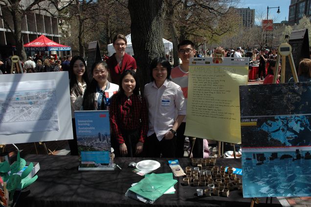 The BU City Planning and Urban Affairs sustainability team is surrounded by their array of interactive projects at the 2016 BU Earth Day Festival