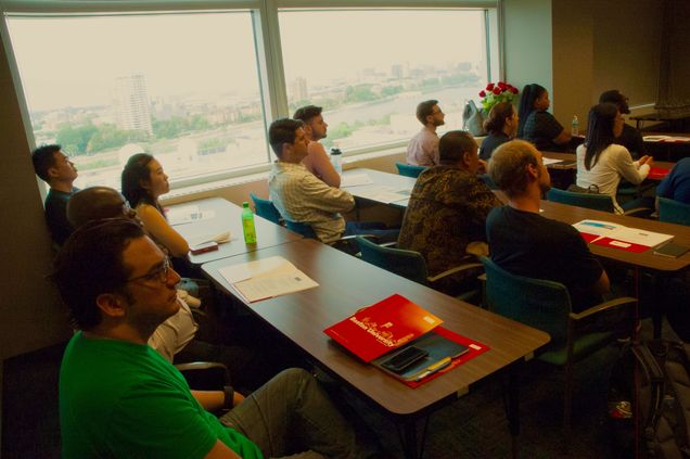 Students attentively listen to the Program's academic and professional offerings