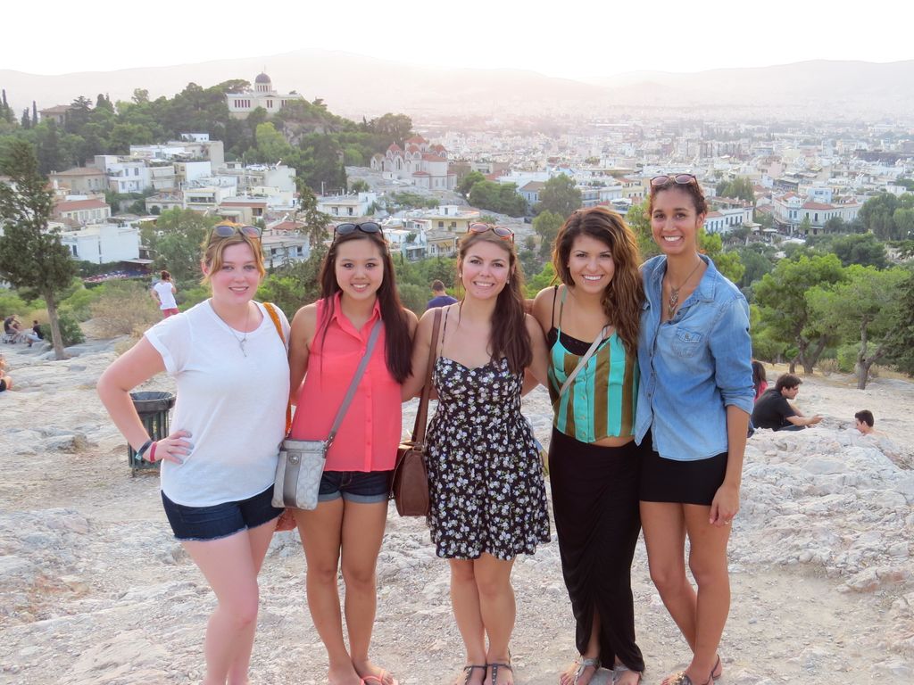 Five people posing for a photo