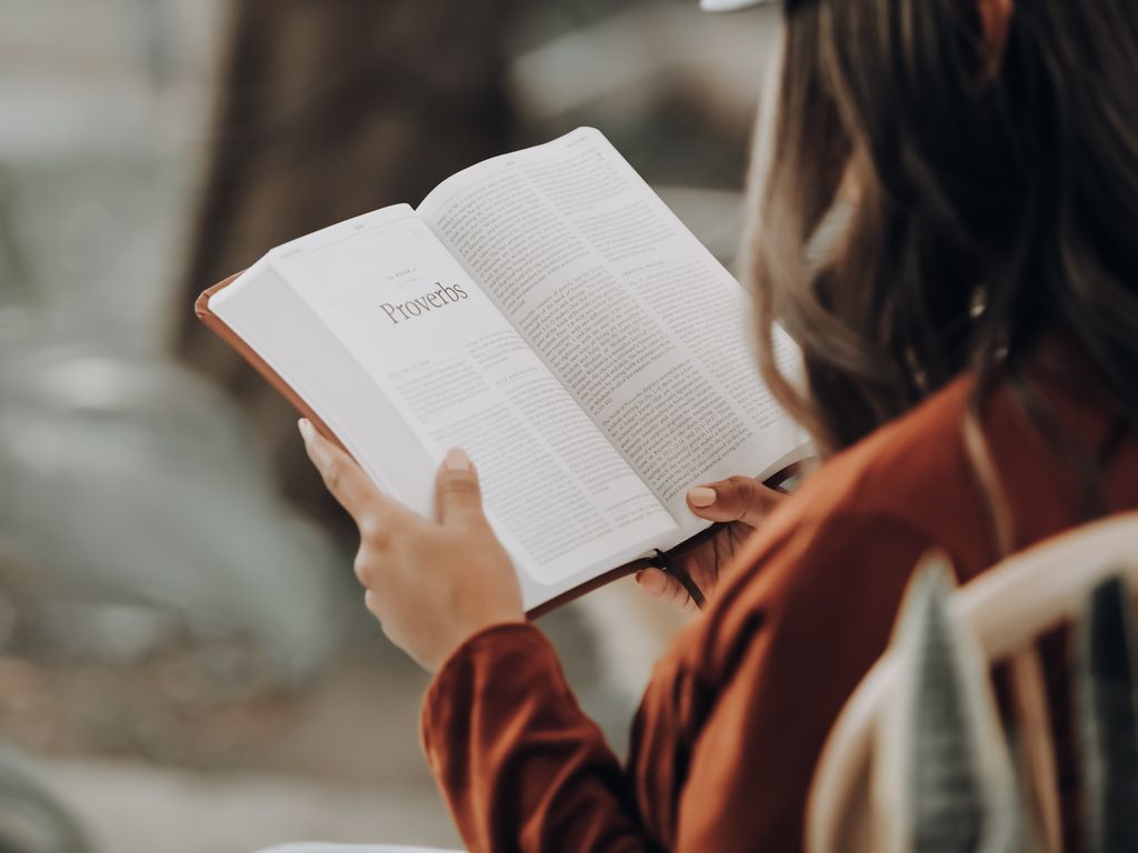 A person holding a book