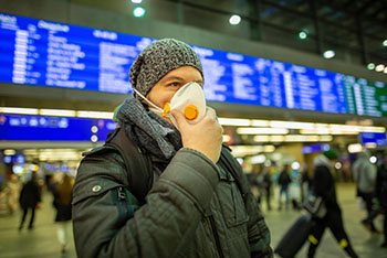 Person wearing face-covering