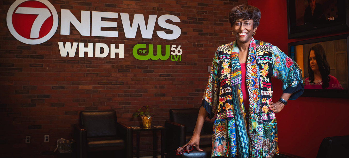 Carmen Fields smiling portrait on set at Channel 7 News.