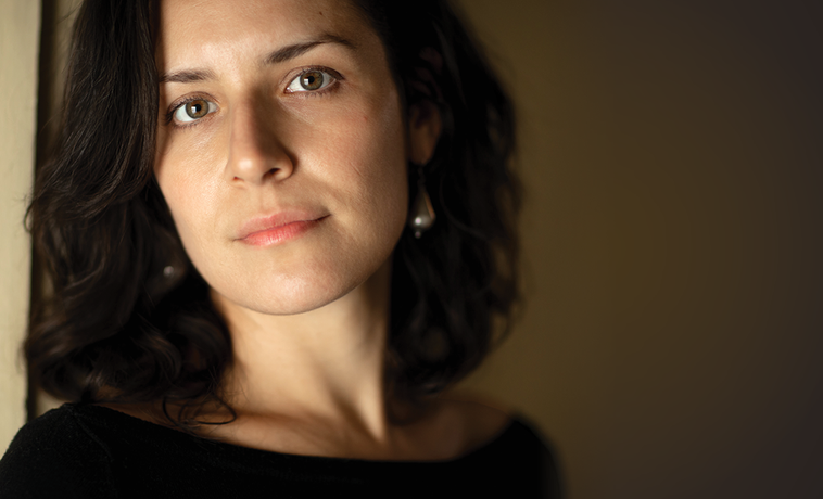 Pulitzer Fellow Sofie Isenberg (’21) wrote 5,200 words on religion and mental health during the pandemic. Photo by John Livzey.