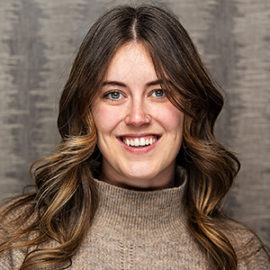 Shannon Sollitt smiling portrait.