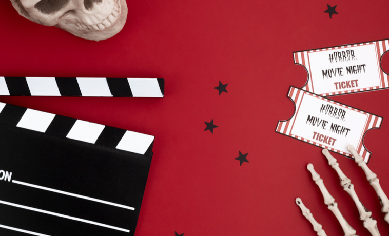 Composite graphic of skull, skeleton hands, movie ticket stubs, and a clapperboard.