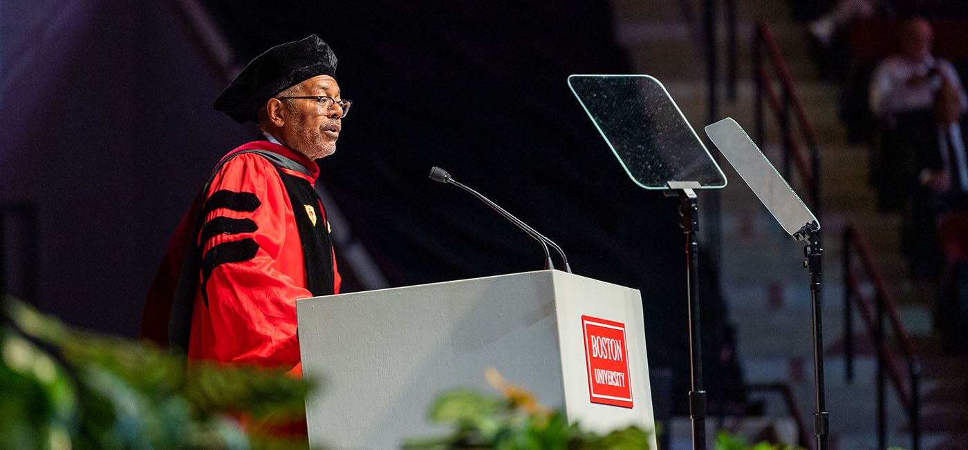 Kevin Merida speaking from the podium at Commencement.