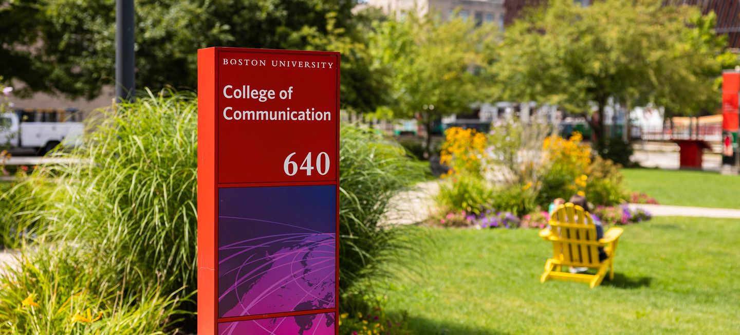 College of Communication sign seen from the COM lawn.