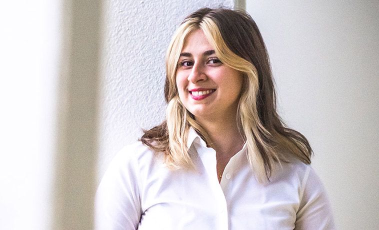 Emma Longo smiling portrait.