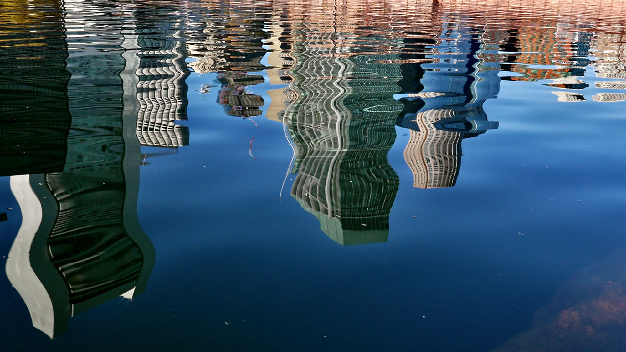Image of the Boston city line reflected in water