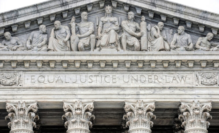 Supreme Court building with engraved text "Equal Justice Under Law."
