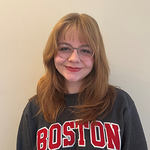 Smiling portrait in a Boston sweatshirt