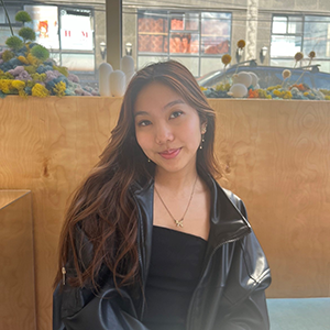 Smiling portrait with black jacket