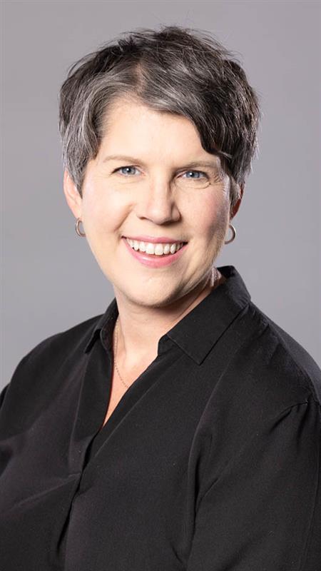 Aimee Christian smiling portrait.