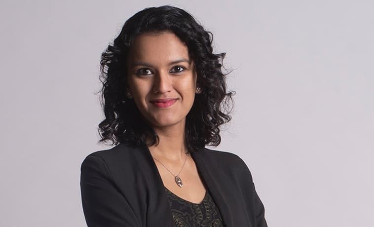 Arunima Krishna smiling portrait.