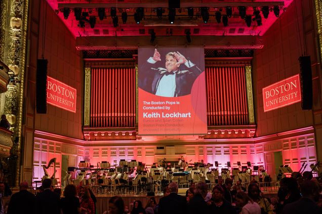 View of Symphony Hall stage set for Boston University.
