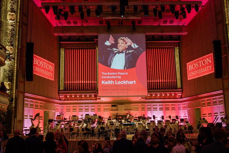 View of Symphony Hall stage set for Boston University.