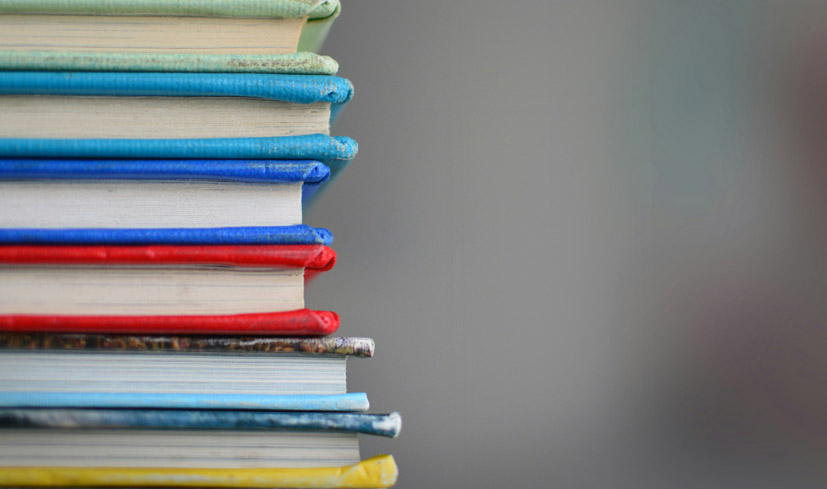 A stack of colorfully covered books