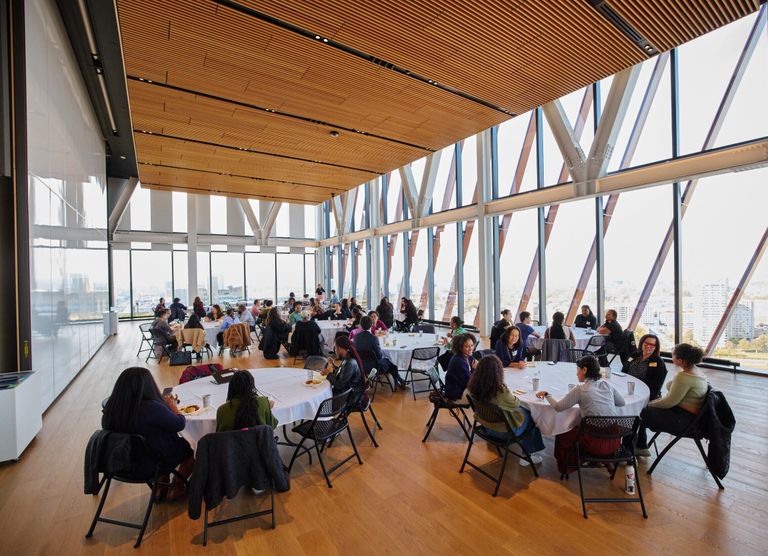 Faculty and staff mingling at the faculty and staff of color luncheon