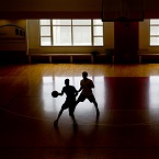 Recreational basketball players going one on one at BU FitRec (2014)