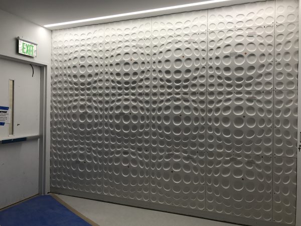 Decorative Wall Panels Installed in West Elevator Lobbies Floors 4-9