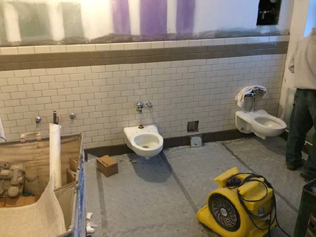 Fixtures being installed in the 4th floor restrooms