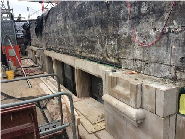Limestone lintels being installed at the 5th floor of the east elevation